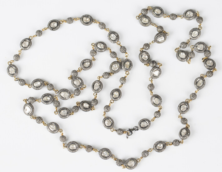 An Indian silver, parcel gilt and diamond oval link necklace, each oval link set to each side with a