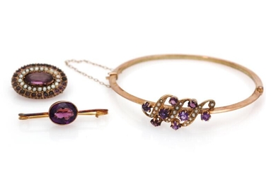 SOLD. An amethyst jewelery collection comprising a bangle and two brooches partly set with numerous circular-cut amethysts and cultured pearls, mounted in 8k gold(3) – Bruun Rasmussen Auctioneers of Fine Art
