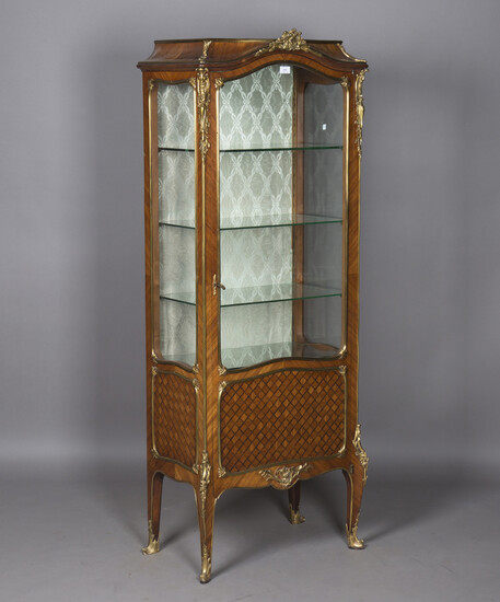 An early 20th century French kingwood and ormolu mounted vitrine, fitted with a glazed and parquetry