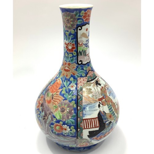 An early 20th century Japanese porcelain vase of onion form,...