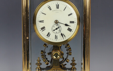 An early 20th century lacquered brass four glass electric mantel clock by Eureka Clock Co Ltd London