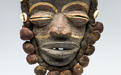 An early African timber cultural mask on metal stand (H:28.5cm-mask...