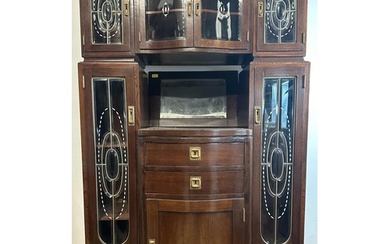An oak Art Deco cabinet comprising of two drawers four glaze...