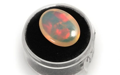 SOLD. An unmounted oval cabochon opal weighing app. 7.42 ct. – Bruun Rasmussen Auctioneers of Fine Art