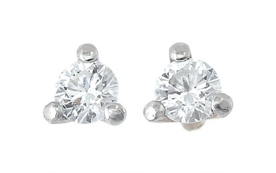Arnby & Mejlvang A pair of diamond solitaire ear studs each set...