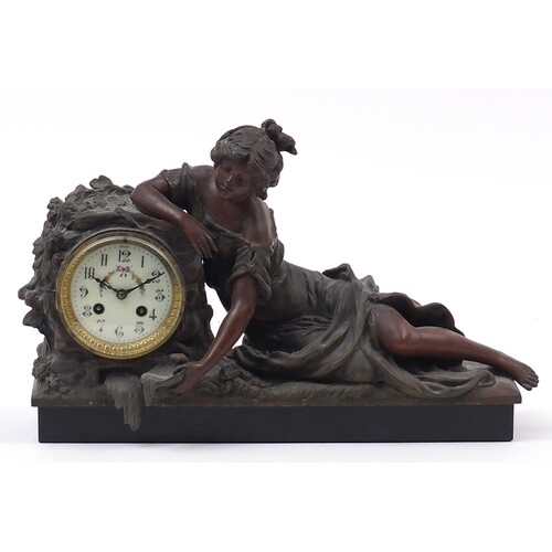 Art Nouveau spelter maiden design mantle clock with circular...