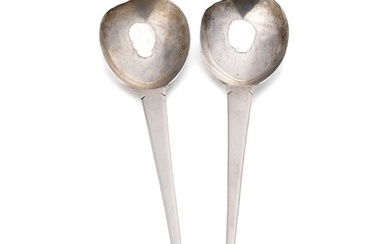 Arts and Crafts style silver spoons, a pair, Hallmarked Lond...