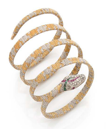 BRACELET ARMILLE in 18K (750) yellow and white gold braided...