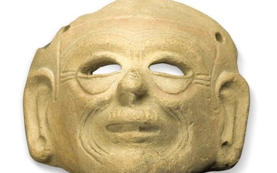 Beige terracotta mask with traces of red paint,...
