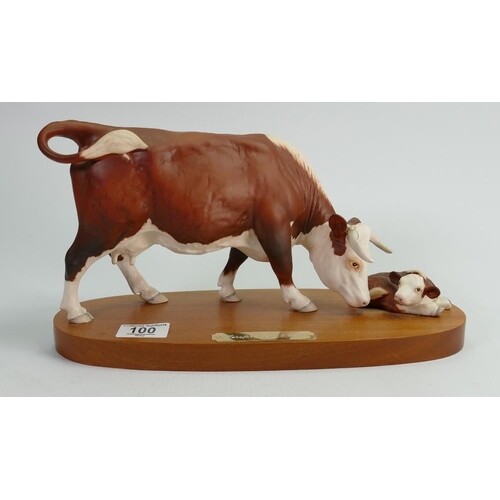 Beswick connoisseur Hereford cow & calf: on wood base.