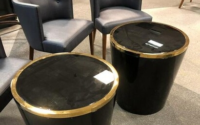 Black and gold cylinder side tables.