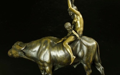 Bronze statue of a water carrier & child on the back of a water buffalo, by Rudolf Marcuse