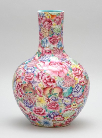 CHINESE POLYCHROME PORCELAIN VASE With cylindrical neck and thousand flowers pattern on body. Six-character Qianlong mark on base. H...