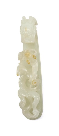 CHINESE WHITE JADE BELT HOOK With raised carved decoration of a qilin and its young. Fine use of russet skin tones. Length 4.25".