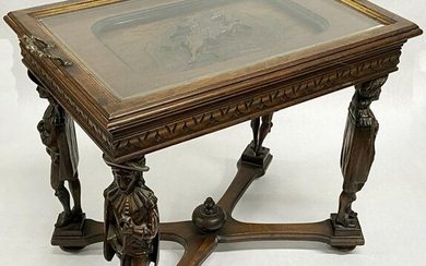 Carved Tray Table with Carved Man Figures.