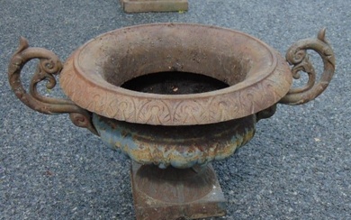 Cast iron garden urn with handles, urn is 31.5" wide (including handles), height is 16.5"