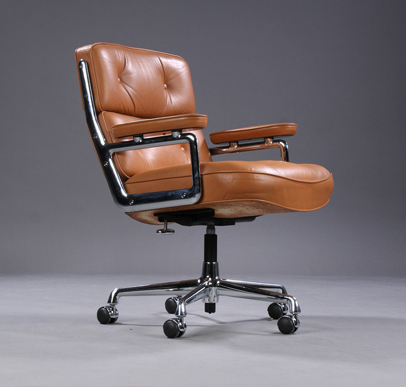 Charles Eames. Vintage office chair. Time Life Lobby Chair, cognac-coloured leather