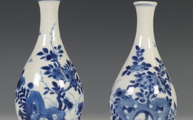 China, two blue-white porcelain vases, Kangxi, each decorated...