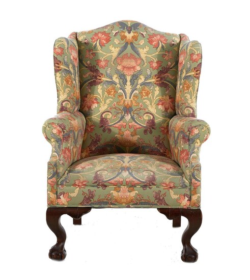 Chippendale style upholstered carved mahogany wingback chair