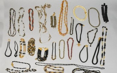 Collection of Black and Gold Tone Necklaces