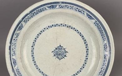 DIJON. Large circular earthenware dish with blue monochrome...