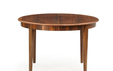SOLD. Danish furniture design: A circular rosewood extension table with one extra leaf. H. 73. Diam. 114. L. 168. (2) – Bruun Rasmussen Auctioneers of Fine Art