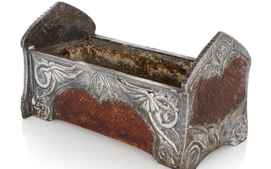 Designer Unknown, Arts and Crafts style planter decorated with dragons en repousse, 'DB' monogram to one side, '7_2/1931' other side, Wood box cased in white metal, snakeskin panels, lead liner, 38.2cm long, 21cm wide, 22cm high