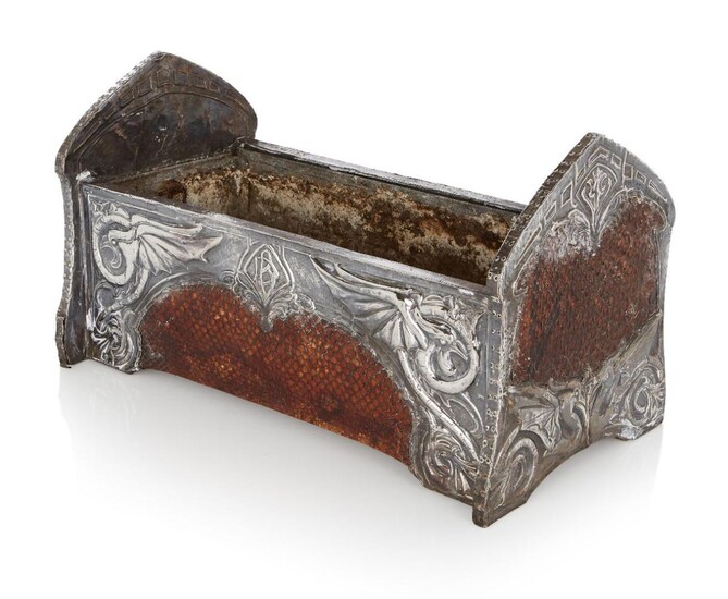Designer Unknown, Arts and Crafts style planter decorated with dragons en repousse, 'DB' monogram to one side, '7_2/1931' other side, Wood box cased in white metal, snakeskin panels, lead liner, 38.2cm long, 21cm wide, 22cm high