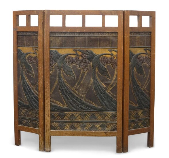 Designer Unknown, Arts & Crafts three-fold fire screen, each panel decorated with flying peacocks, circa 1900, Oak, Leather, Vellum and papier mache, Unmarked, 69cm x 74cm maximum Footnote: A similar example sold Christies, Lot 98, 20th April 2000.