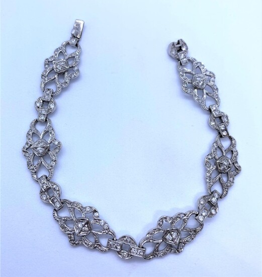 Diamond Encrusted 18K White Gold Bracelet, weight 17.3g and...