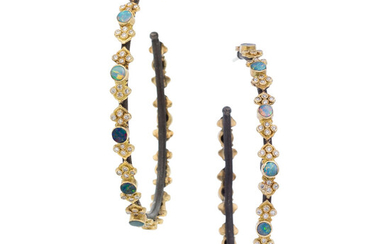 Diamond, Opal, Gold, Silver Earrings The hoop earrings feature...