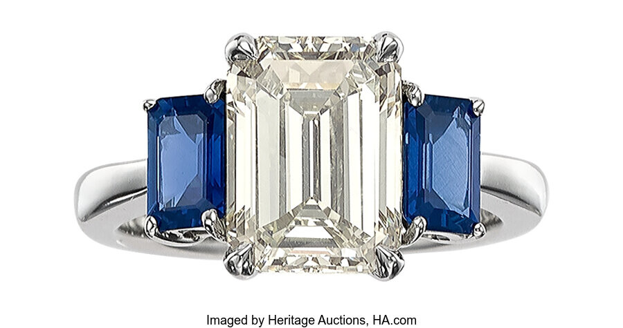 Diamond, Sapphire, Platinum Ring Stones: Emerald-cut diamond weighing 3.58...