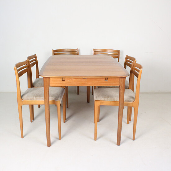 Dining table group: set of chairs and dining table, teak.