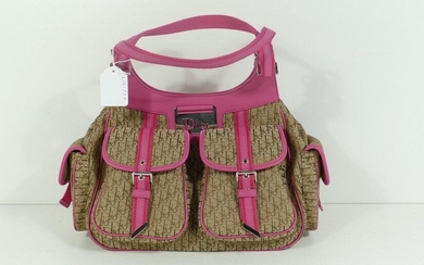Dior bag in monogrammed canvas and pink leather