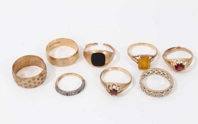 Eight 9ct gold rings