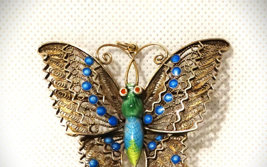 Elegant brooch can also be worn as a pendant made of gold-plated silver with enamel and turquoise, around 1970.