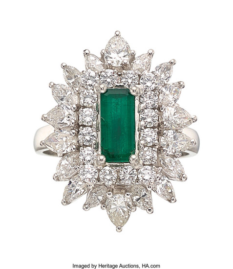 Emerald, Diamond, Platinum Ring-Dant The ring-dant centers an...