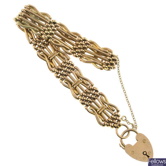 Fancy-link bracelet, with heart-shape padlock clasp.