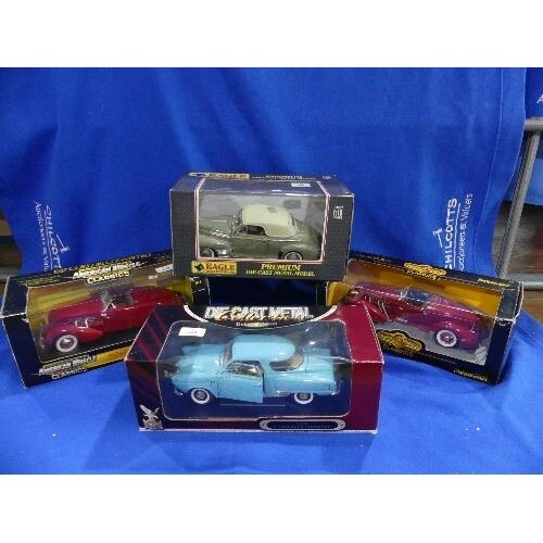 Four 1:18 scale die-cast Models, including two 'American Mus...