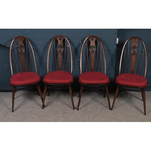 Four Ercol swan back dining chairs. (100cm height, 44cm widt...