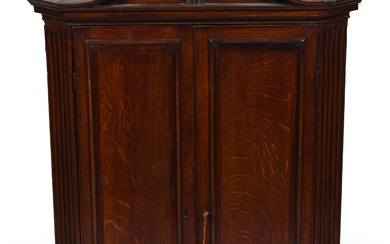 GEORGE III STYLE OAK HANGING CORNER CABINET, 19TH CENTURY 46 1/4 x 31 3/4 x 20 in. (117.5 x 80.6 x 50.8 cm.)
