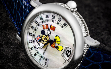 GERALD GENTA. A VERY RARE 18K WHITE GOLD LIMITED EDITION AUTOMATIC JUMP HOUR WRISTWATCH WITH RETROGRADE MINUTES AND MOTHER-OF-PEARL DIAL MICKEY MOUSE RETRO FANTASY MODEL