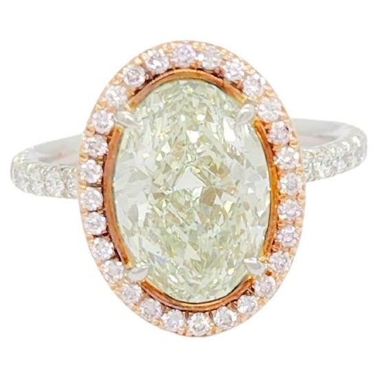 GIA Green Diamond Oval and Pink Diamond Ring in Platinum and 18k Rose Gold