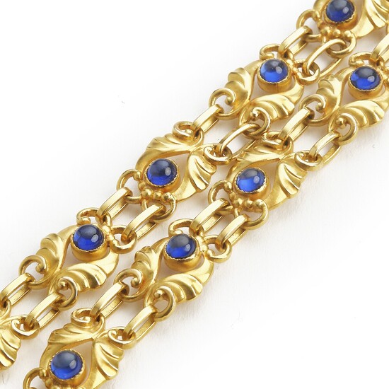 Georg Jensen: A sapphire necklace set with numerous synthetic cabochon sapphires, mounted in 18k gold. Design no. 249. L. app. 37.5 cm. 1933–44.