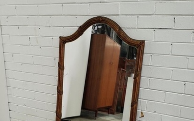Gilt Arched Top Mirror, the reeded frame tied by leaves (h:125 x w:67cm)