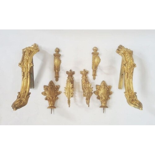 Gilt metal wall fittings, four pairs, all slightly different...