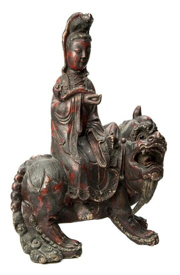 Goddess Guanyin sitting on a Qilin.