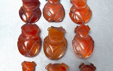 Group of 9 Chinese Carved Carnelian Agate Figure Pendants
