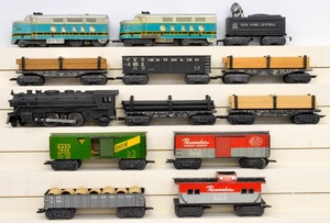 Group of Marx O gauge trains with type D trucks and plastic automatic couplers