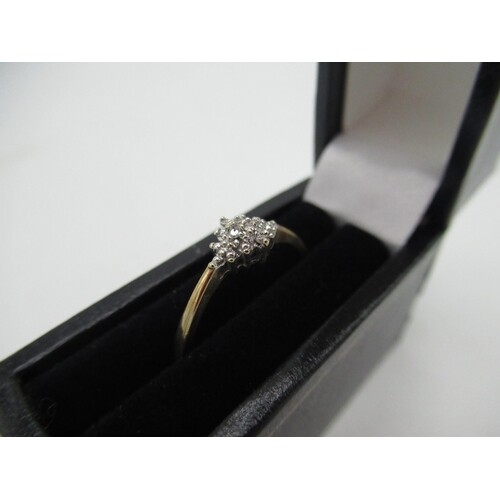 Hallmarked 9ct yellow gold ring with cluster of round cut di...
